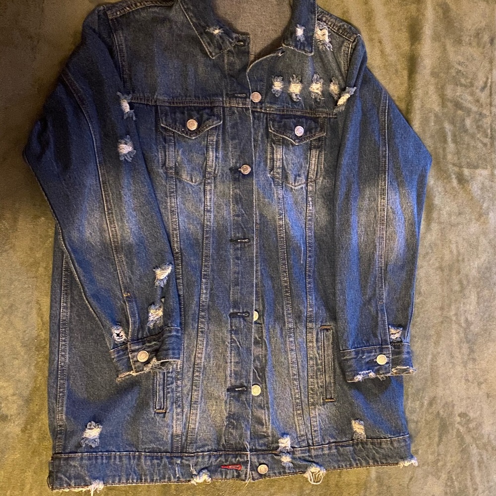 Long distressed denim jacket